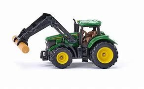 Tracteur John Deere avec pince à bois